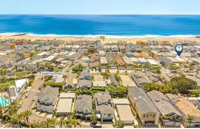 an aerial view of a city with the ocean at 5Br Retreat With Balcony And Patio, 2 Homes From Sand By Beachview Rentals in Newport Beach