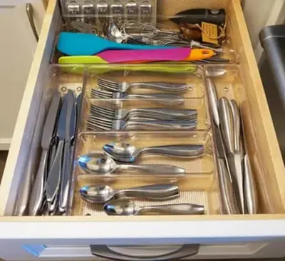 a drawer full of silver utensils in a drawer at Entire Private Home with 1 Bedroom, 1 Bathroom, King Bed, Hot Tub, Parking, View, Available Now in San Diego
