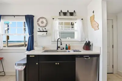 a kitchen with a sink and a window at NEW Oceanfront Luxury Christian RARE Single Family Home in San Diego
