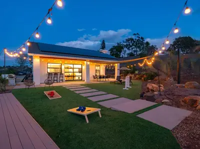 a backyard with a picnic table in the grass at Vista Oasis with Spa, Pool, & Views in Vista