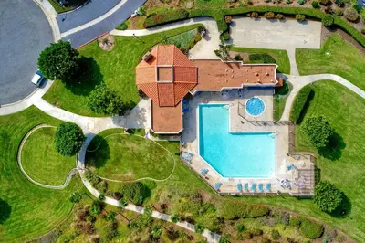 an overhead view of a house with a swimming pool at Luxury Coastal Escape | Sleeps 4 | Ocean Views + Resort Amenities in Carlsbad
