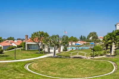 a view of a park with a playground at Luxury Coastal Escape | Sleeps 4 | Ocean Views + Resort Amenities in Carlsbad
