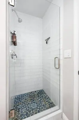 a bathroom with a shower with a glass door at Walk To Ponto Beach - Surf and Relax in Carlsbad