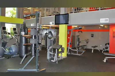 a gym with several treadmills and machines in it at Snazzy 2BR Near Petco Park & Convention Center in San Diego