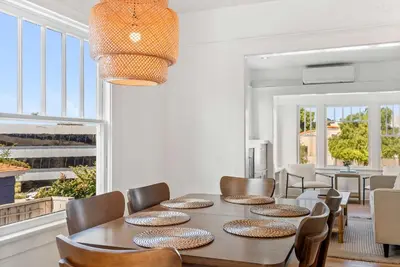 a dining room with a table and chairs at Cliff View - Prime Downtown La Jolla in San Diego