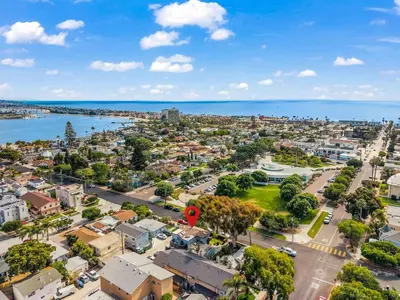an aerial view of a city and the ocean at Vintage Surf Hut by Coastline Vacation Rentals in San Diego