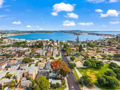 an aerial view of a city with a body of water at Vintage Surf Hut by Coastline Vacation Rentals in San Diego