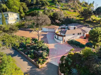 an overhead view of a house with a driveway at Sunset Summit by Coastline Vacation Rentals in La Mesa