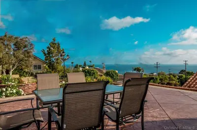a patio with a table and chairs on a patio at La Jolla private Studio in San Diego