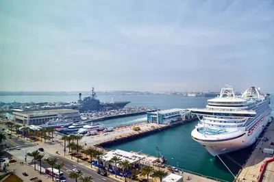 a large cruise ship docked in a harbor at SpringHill Suites by Marriott San Diego Downtown/Bayfront in San Diego
