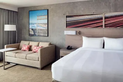 a hotel room with a bed and a couch at Residence Inn by Marriott San Diego Downtown/Bayfront in San Diego