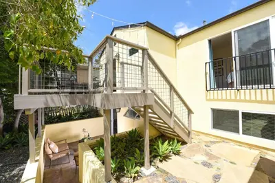 a staircase in front of a house at 4 Bdr 2 Bth in heart of Hilcrest 10 minutes from balboa park in San Diego