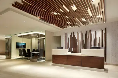 an office lobby with a reception desk and a large organ at Homewood Suites by Hilton San Diego Mission Valley/Zoo in San Diego