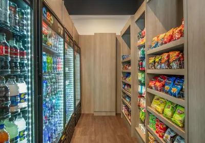 a grocery store aisle with drinks and soda at Crowne Plaza San Diego - Mission Valley by IHG in San Diego