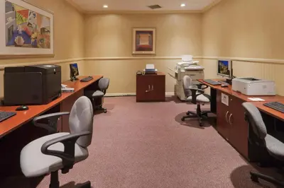 an office with desks and chairs in a room at Crowne Plaza San Diego - Mission Valley by IHG in San Diego