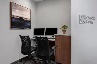 an office with a desk with three chairs and a computer at Courtyard by Marriott San Diego Miramar in San Diego