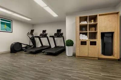 a gym with cardio equipment in a room at Sonesta Simply Suites Irvine East Foothill in Lake Forest