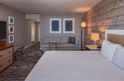 a hotel room with a bed and a couch at Hyatt Regency Mission Bay Spa and Marina in San Diego