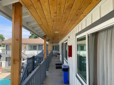 a porch with a wooden ceiling on a house at Ramona Valley Inn - Ramona in Ramona