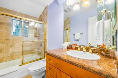a bathroom with a sink and a shower and a toilet at The Shangri-La of La Jolla in San Diego