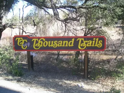 a sign for the town of flosslandisksemetery at Oakzanita Springs Camping Resort Cottage 3 in Descanso