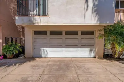 a garage door in front of a building at Holiday Home in Oceanside