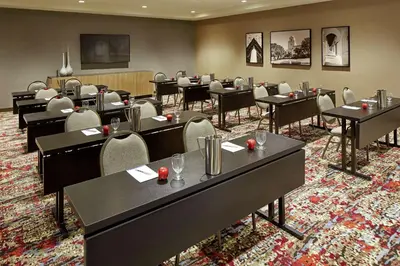 a conference room with tables and chairs in it at Hilton Garden Inn San Diego Old Town/Sea World Area in San Diego