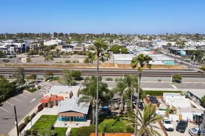 an aerial view of a town with palm trees at Oceanside Rocks Family Vacation Home in Oceanside