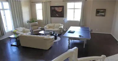 a living room with couches and a coffee table at Mansion on the Hill let 4 Rooms, 5th cost extra in Sage