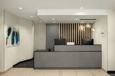 a lobby with a reception desk in a building at TownePlace Suites by Marriott San Diego Carlsbad / Vista in Vista