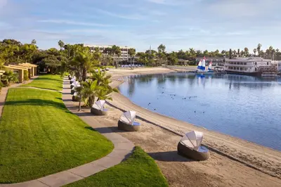 a park with a body of water with a marina at Bahia Resort Hotel in San Diego