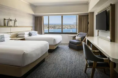 a hotel room with two beds and a television at Marriott Marquis San Diego Marina in San Diego