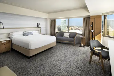 a hotel room with a bed and a chair at Marriott Marquis San Diego Marina in San Diego