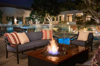 a living room with a couch and a fire pit at San Diego Marriott Mission Valley in San Diego