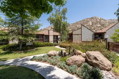 a house with a garden and rocks in the yard at San Diego Country Estates in Ramona