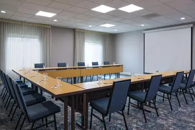 a large conference room with a long table and chairs at Courtyard San Diego Old Town in San Diego