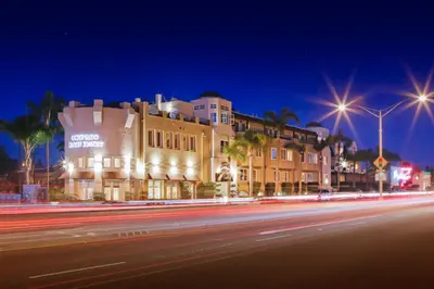 a building on a city street at night at Coronado Beach Resort in San Diego