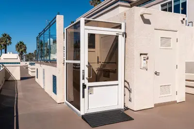 an open door on the side of a building at Southern California Beach Club in Oceanside