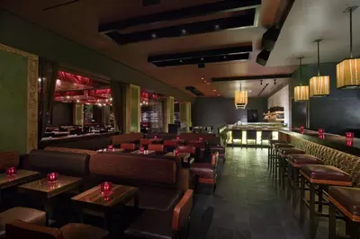 a restaurant with couches and tables and a bar at Hard Rock Hotel San Diego in San Diego