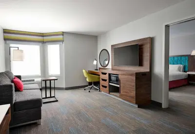 a hotel room with a bed and a television at Hampton Inn San Diego/Del Mar in San Diego