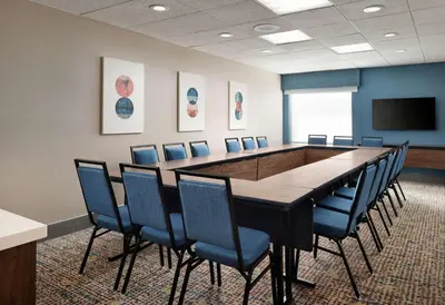 a conference room with a long table and chairs at Hampton Inn San Diego/Del Mar in San Diego