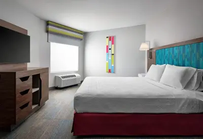 a hotel room with a bed and a television at Hampton Inn San Diego/Del Mar in San Diego