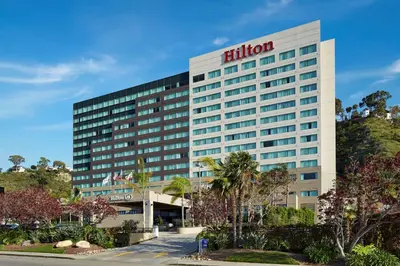 a hotel building with a hilton sign on it at Hilton San Diego Mission Valley in San Diego