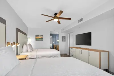 a bedroom with two beds and a ceiling fan at Homewood Suites by Hilton Carlsbad-North San Diego County in Carlsbad