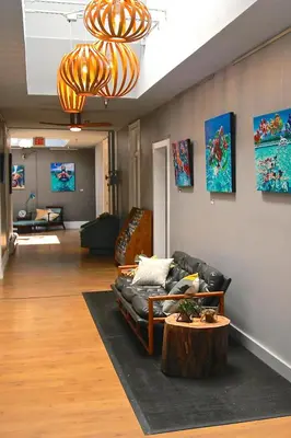 a living room with a couch and a coffee table at HI San Diego Downtown Hostel in San Diego