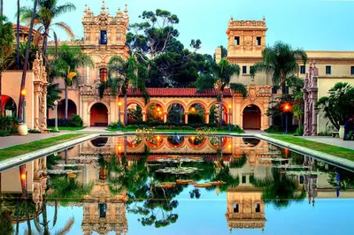 a building with a reflecting pool in front of it at GreenTree Inn San Diego Mission Bay in San Diego