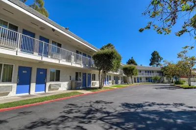an empty street in front of a building at Motel 6-San Diego, CA - North in San Diego