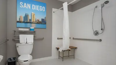 a bathroom with a toilet and a sign that reads san diego at Motel 6-San Diego, CA - Downtown in San Diego