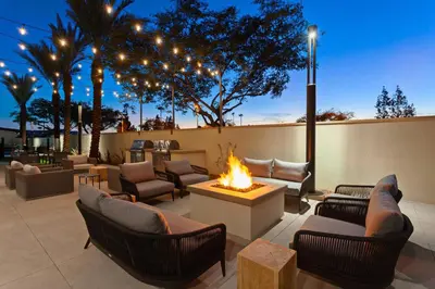 a patio with couches and a fire pit at TownePlace Suites by Marriott San Diego Central in San Diego