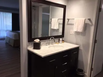a bathroom with a sink and a mirror at Best Western Plus Dana Point Inn-by-the-Sea in Dana Point